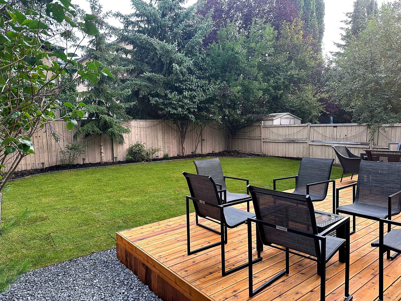 Backyard deck and lawn renovation by All Craft Mastery