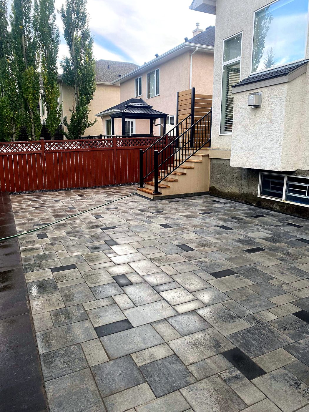 Large paver patio and stairs build by All Craft Mastery